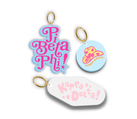 Sorority-themed custom keychains featuring colorful designs for Pi Beta Phi, Sigma Kappa, and Kappa Delta